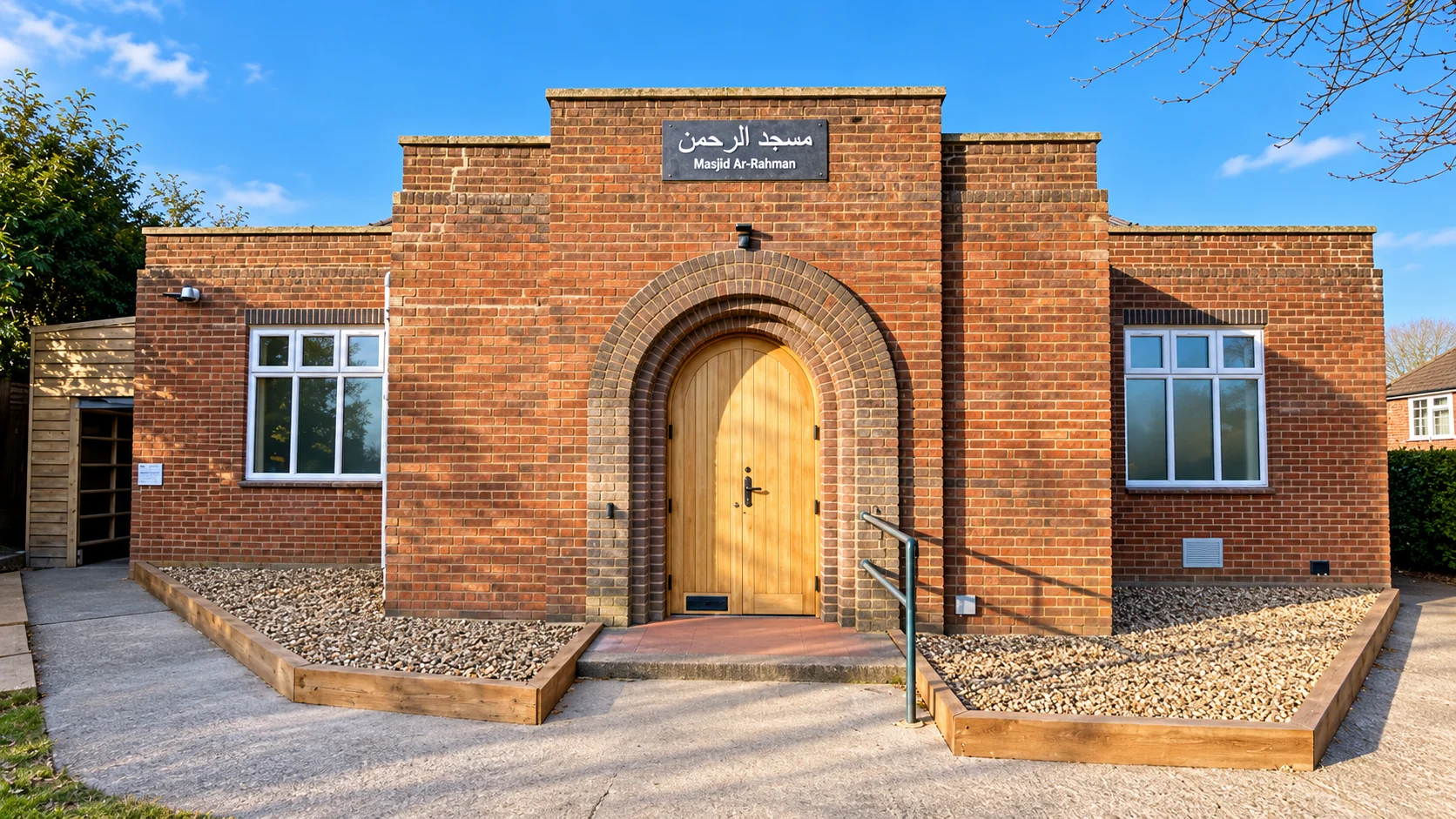 Masjid Ar-Rahman in Sopwell, with its brick facade, arched entrance and mosque sign